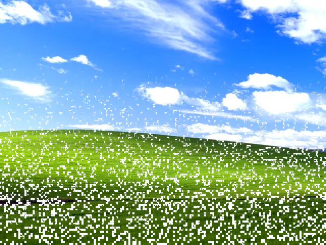 Landscape broken into square cells, some drifting down and fading out of the grid.