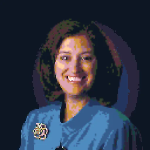 Four-pixel head-and-shoulders portrait mapped to the Color 32 palette, with more shades in the face and jacket.